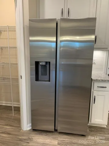 a view of a room that has a window in it