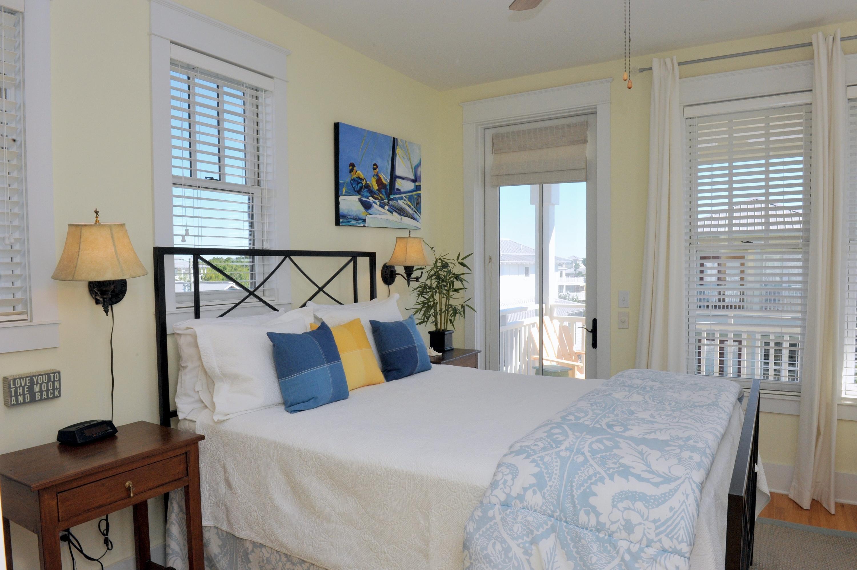 97 Chelsea Loop Road Santa Rosa Beach, FL 32459 - Photo 19 of 26 a bedroom with a bed a dresser and a window
