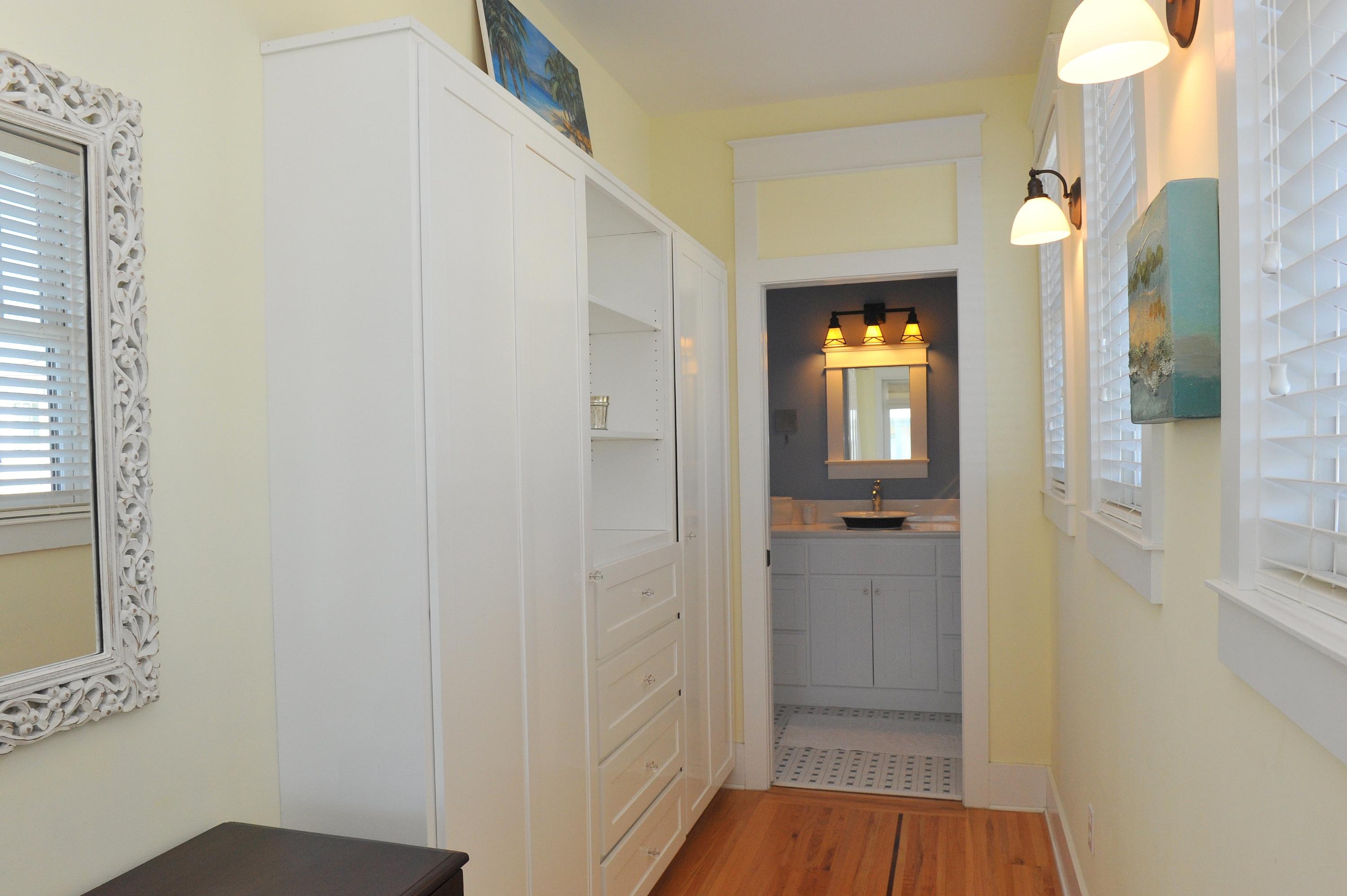 97 Chelsea Loop Road Santa Rosa Beach, FL 32459 - Photo 20 of 26 a view of a room with wooden floor and mirror