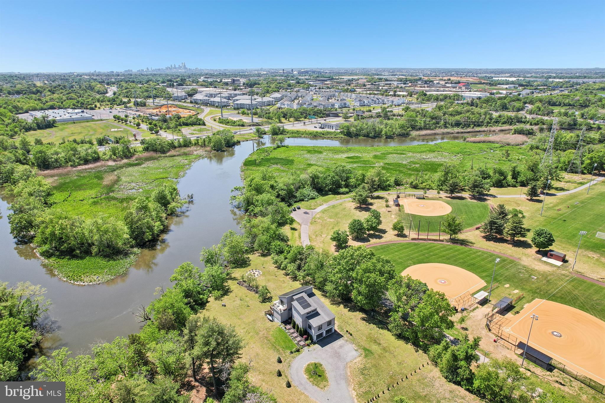 11 Forklanding Road Cinnaminson, NJ 08077 - Photo 56 of 77 an aerial view of residential houses with outdoor space and river