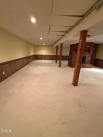 a view of an empty room with a balcony