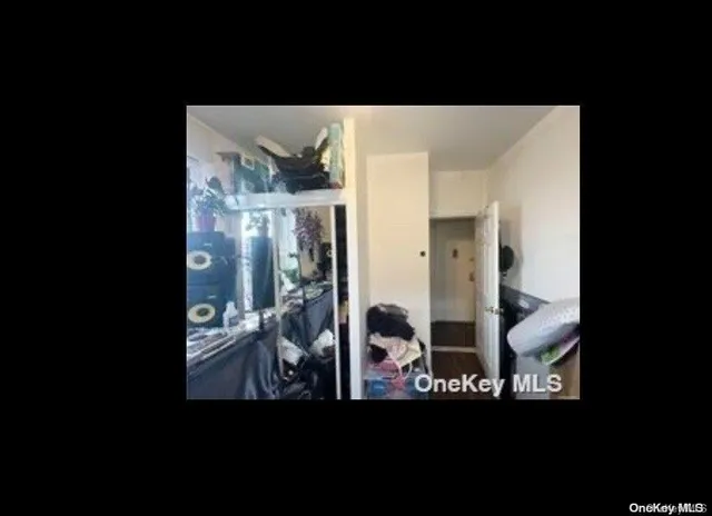 a view of living room with furniture and flat screen tv