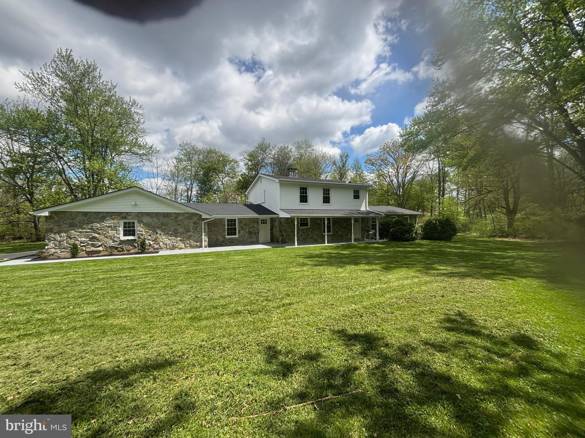 503 Whitman Lane Middletown, PA 17057 - Photo 2 of 58 a front view of a house with a garden