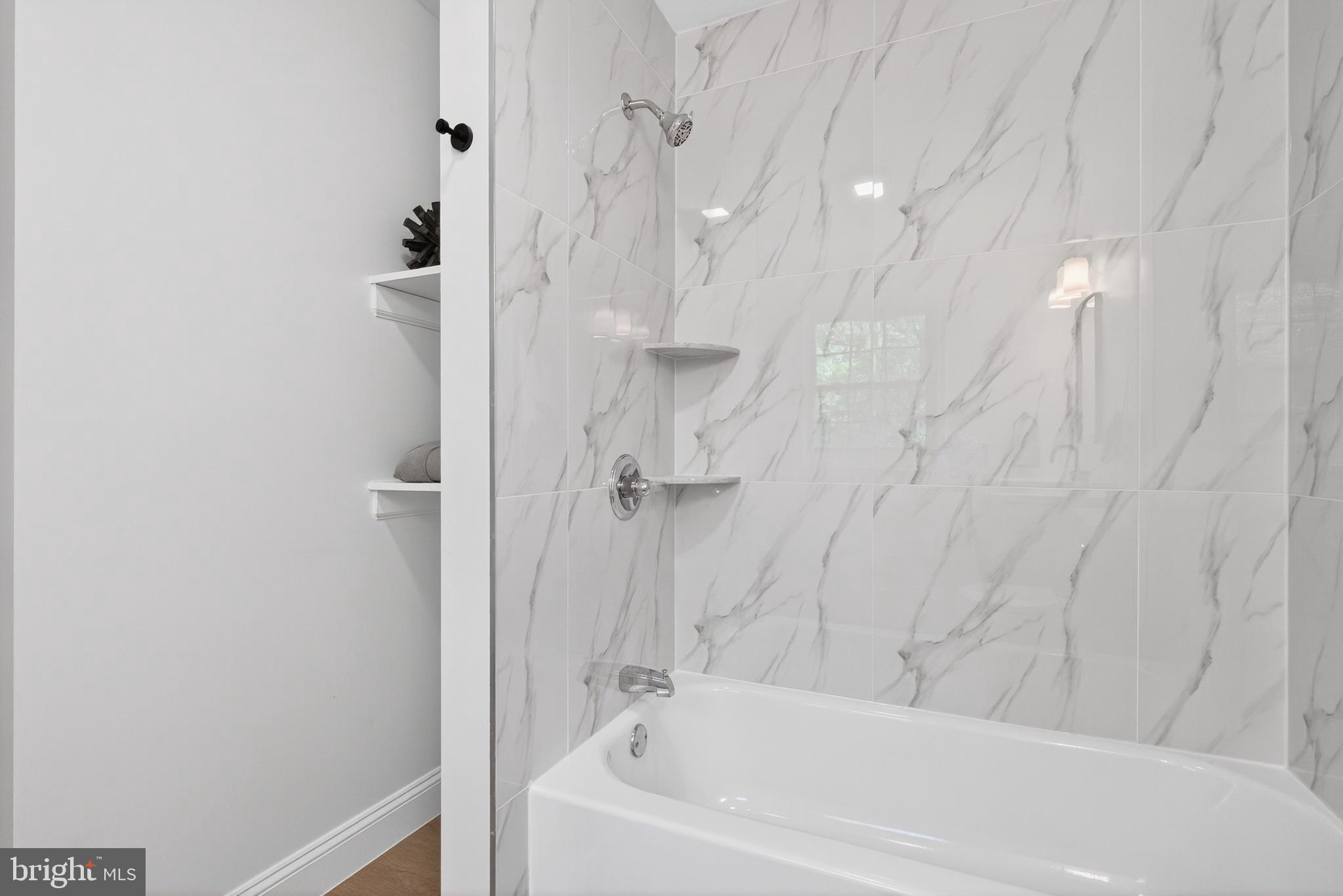 503 Whitman Lane Middletown, PA 17057 - Photo 30 of 58 a bathroom with a bathtub