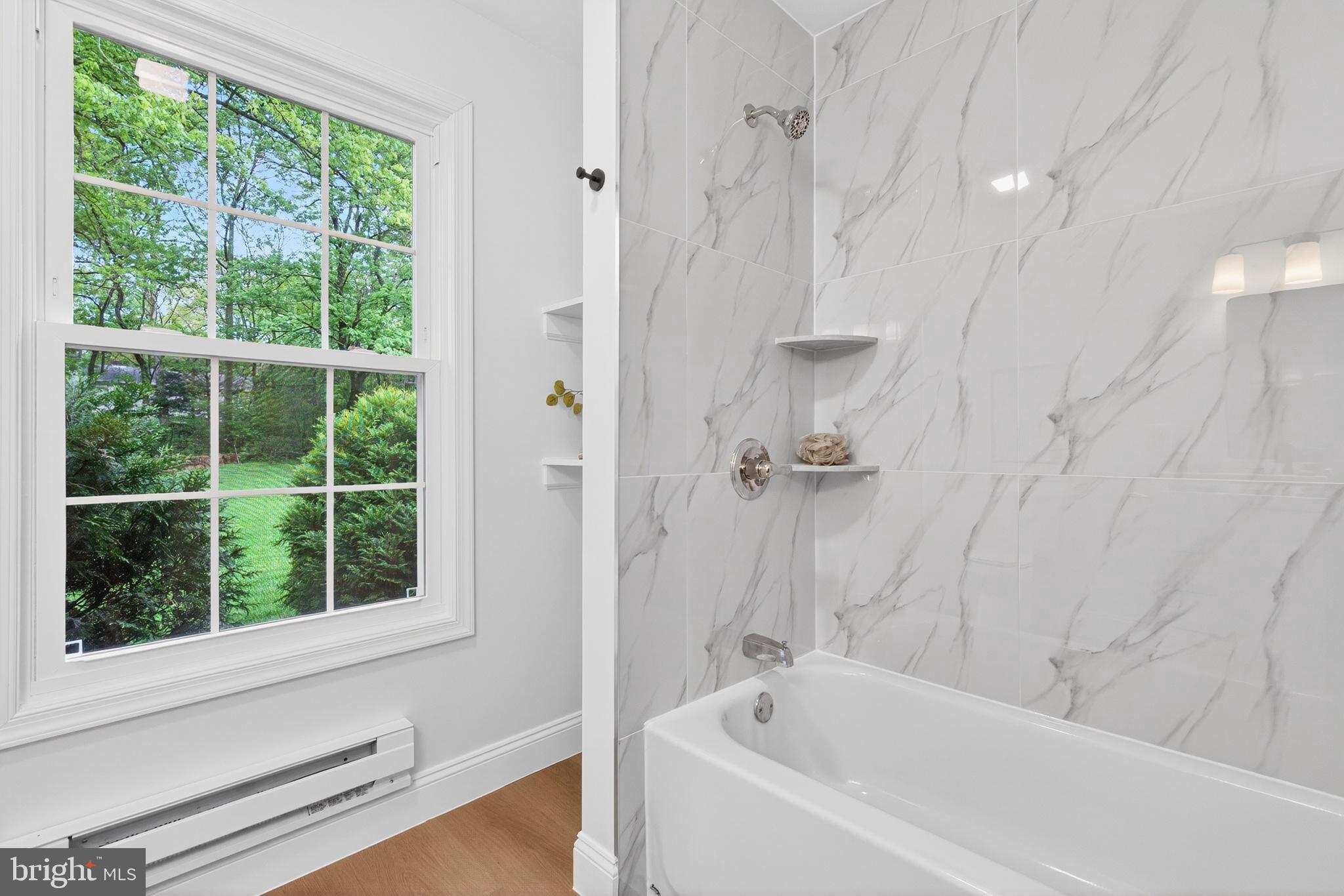 503 Whitman Lane Middletown, PA 17057 - Photo 36 of 58 a white bath tub sitting next to a window
