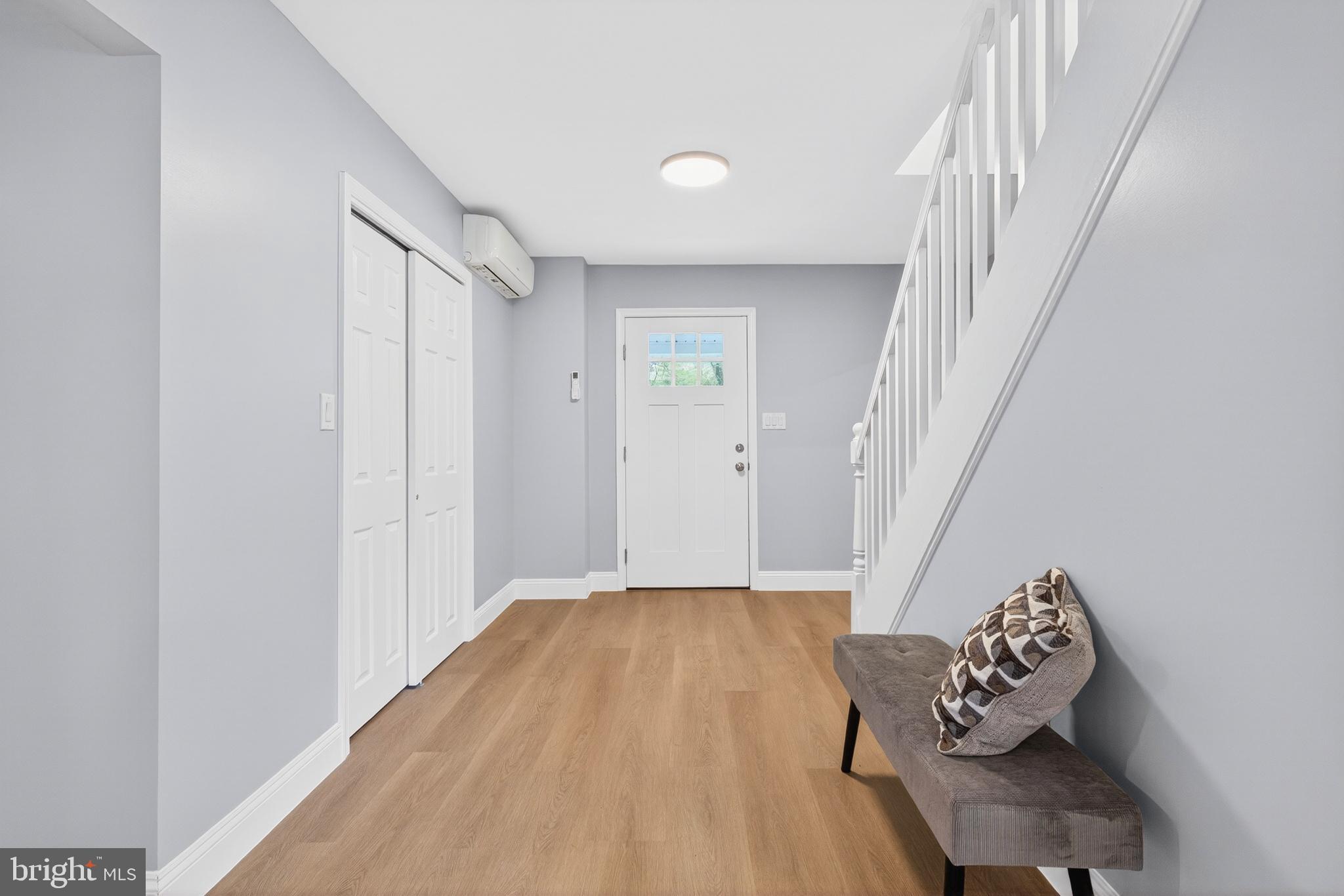 503 Whitman Lane Middletown, PA 17057 - Photo 58 of 58 a view of a hallway with wooden floor and stairs