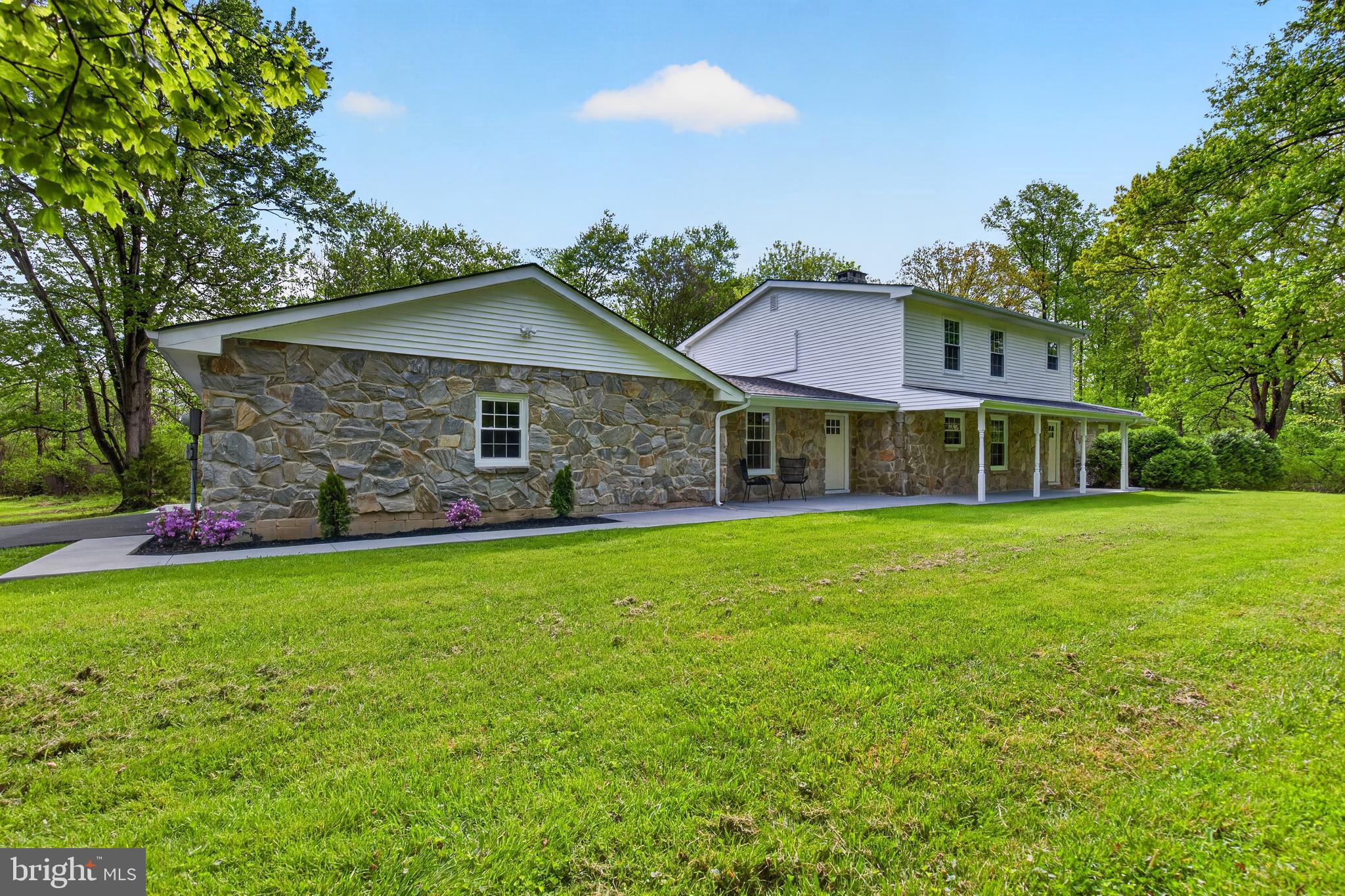 503 Whitman Lane Middletown, PA 17057 - Photo 8 of 58 a front view of a house with a garden