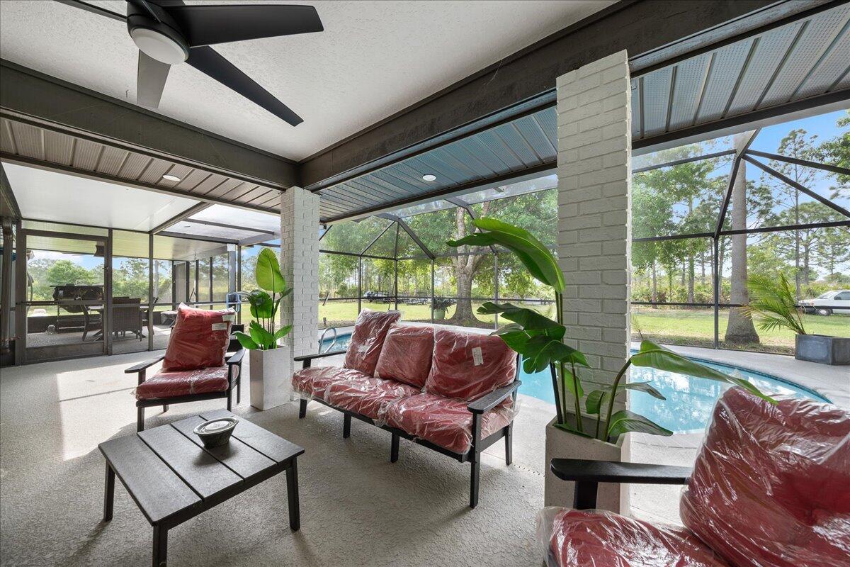 613 Grant Road Palm Bay, FL 32909 - Photo 17 of 40 a outdoor living space with furniture