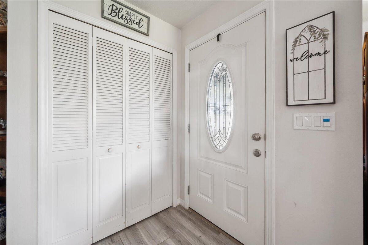613 Grant Road Palm Bay, FL 32909 - Photo 21 of 40 a view of a door with wooden floor