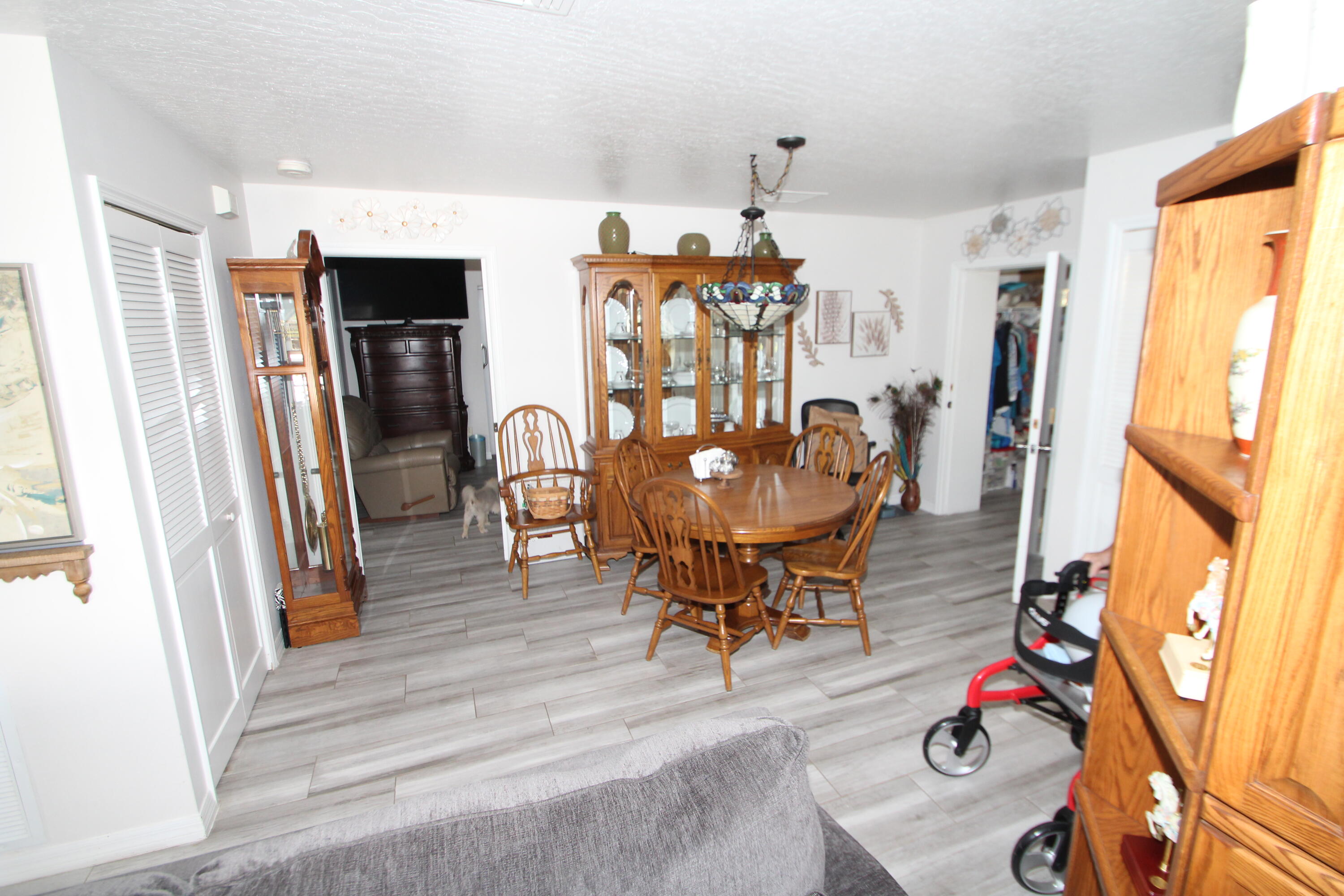 613 Grant Road Palm Bay, FL 32909 - Photo 24 of 40 a view of a livingroom with furniture wooden floor and entryway