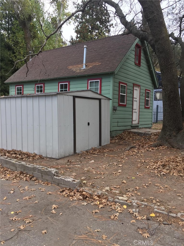 369 Log Crestline, CA 92325 - Photo 11 of 12 a view of a house with a yard