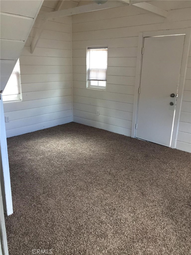 369 Log Crestline, CA 92325 - Photo 9 of 12 a view of an empty room with a window