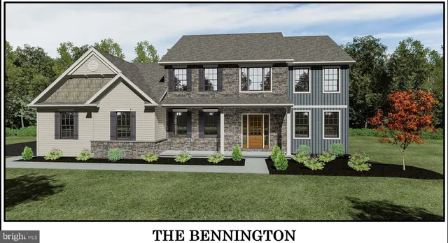 a view of a house with a yard and plants