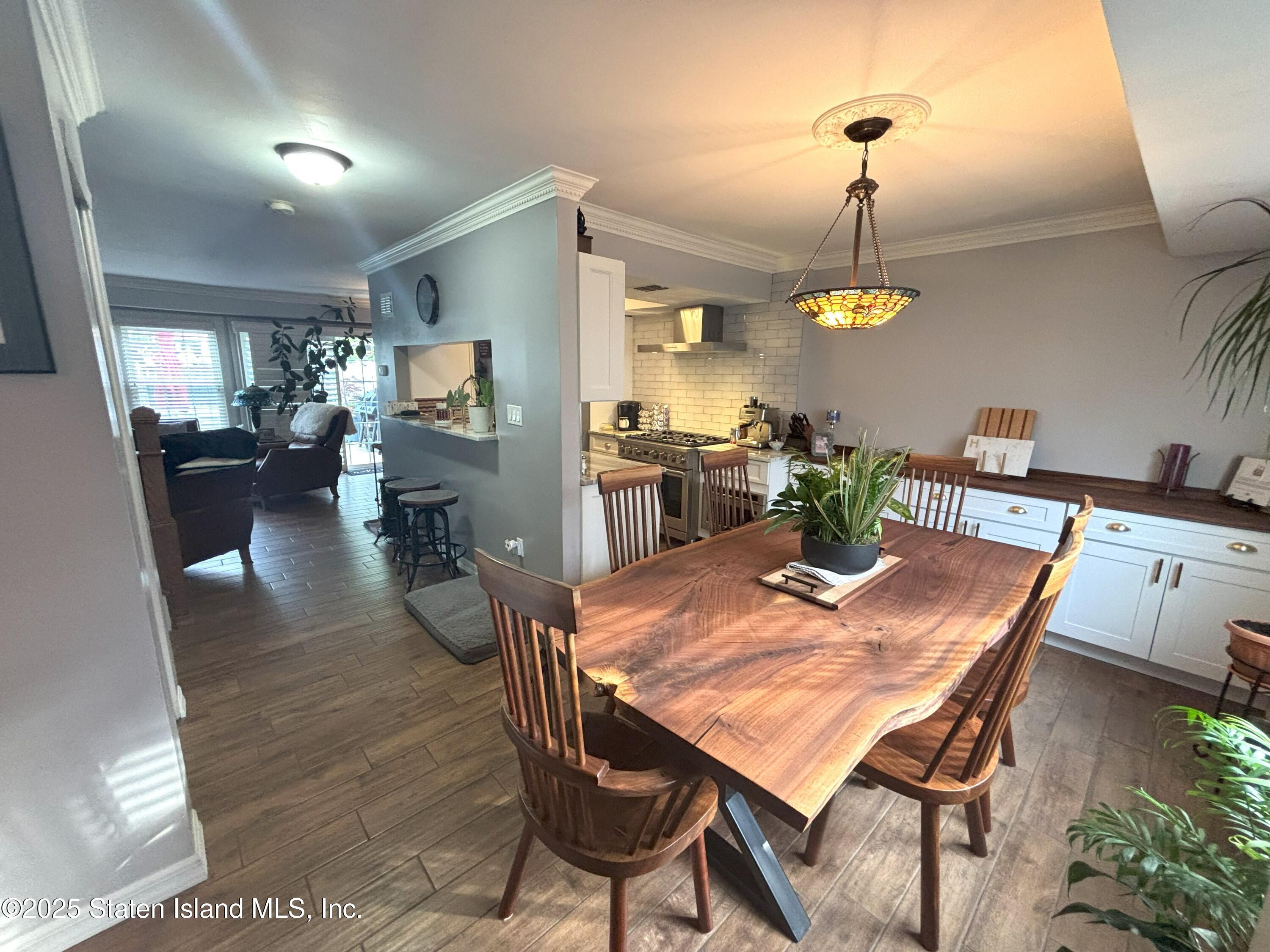 73 Hampton Green Staten Island, NY 10312 - Photo 3 of 28 a view of a dining room with furniture