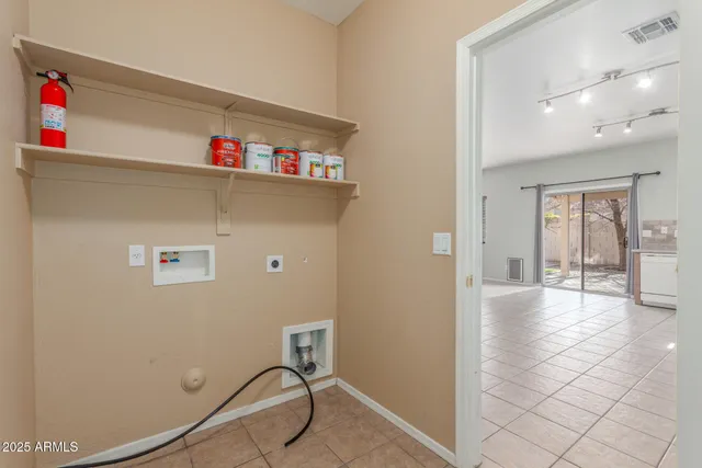 a view of livingroom with furniture and workspace