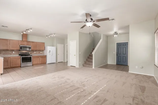 a view of a kitchen with a sink and a kitchen