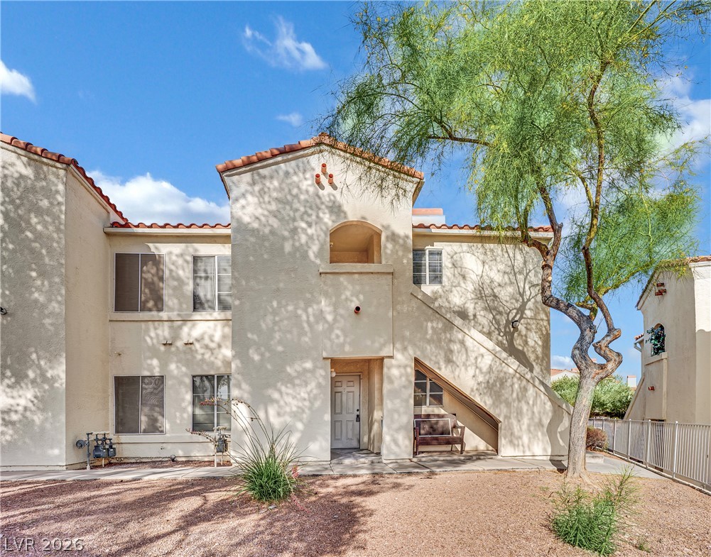 698 South Racetrack Road, Unit 1521 Henderson, NV 89015 - Photo 1 of 33 A well-maintained stucco facade with a red tile roof welcomes you home.