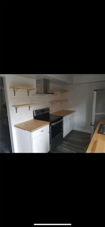 a view of kitchen island with furniture
