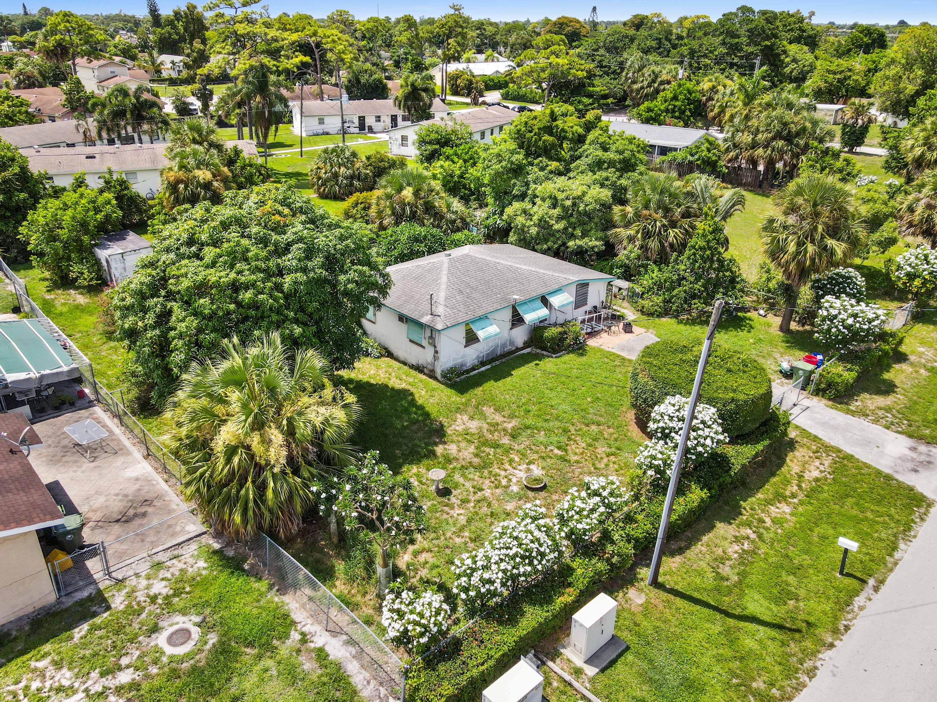 2653 Gulfstream Road Palm Springs, FL 33406 - Photo 11 of 19 11 drone 11