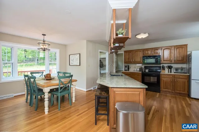 a bedroom with a bed and a chair