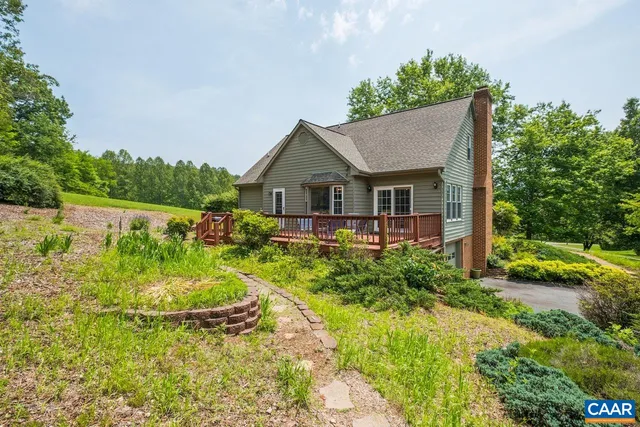 a view of a mountain from a yard