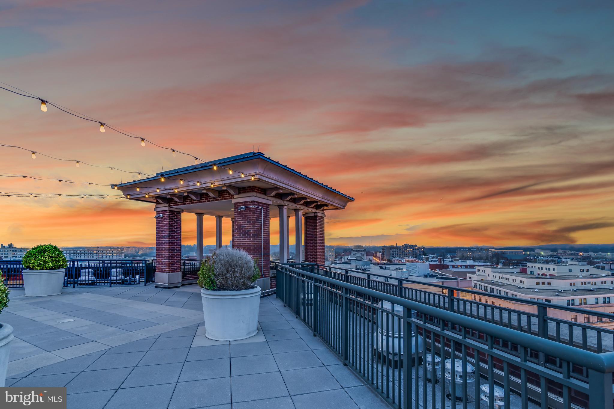 1390 Kenyon Street Northwest, Unit 510 Washington, DC 20010 - Photo 25 of 39 a front view of a house with a yard