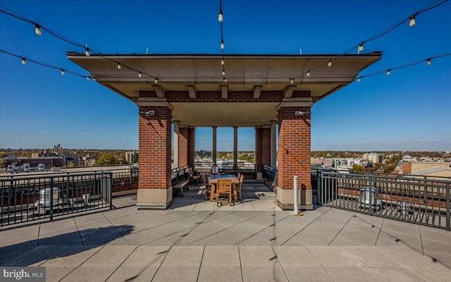 a view of roof deck with patio