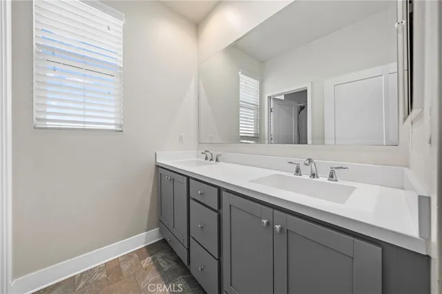 a white toilet sitting next to a bath tub