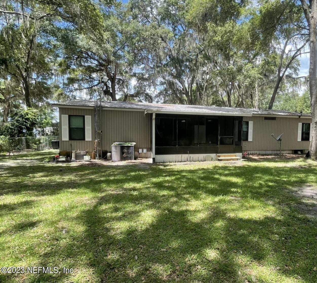 130 Walker Drive Interlachen, FL 32148 - Photo 2 of 31 a front view of house with yard