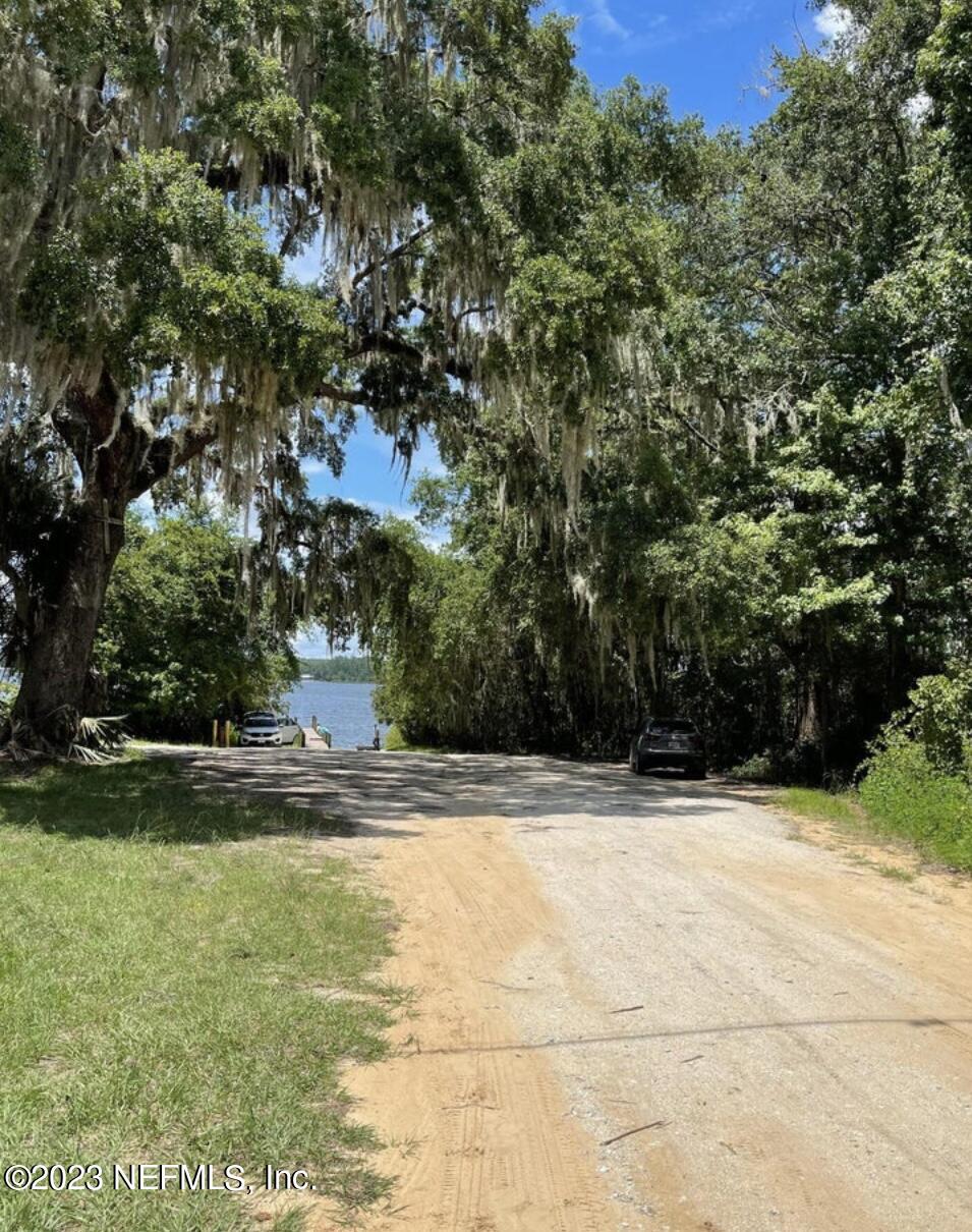 130 Walker Drive Interlachen, FL 32148 - Photo 29 of 31 a view of swimming pool with a yard