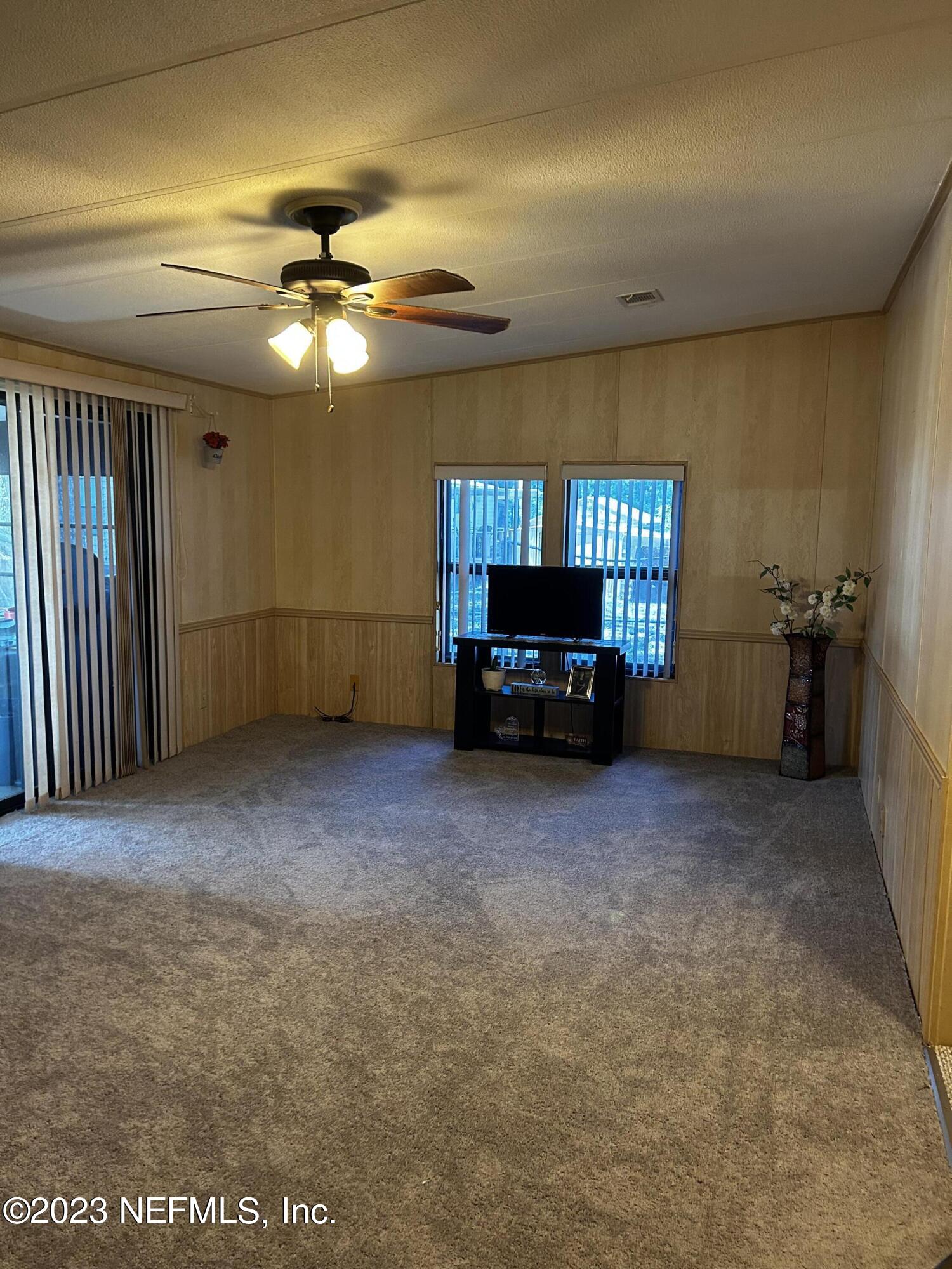 130 Walker Drive Interlachen, FL 32148 - Photo 8 of 31 a view of a livingroom with furniture