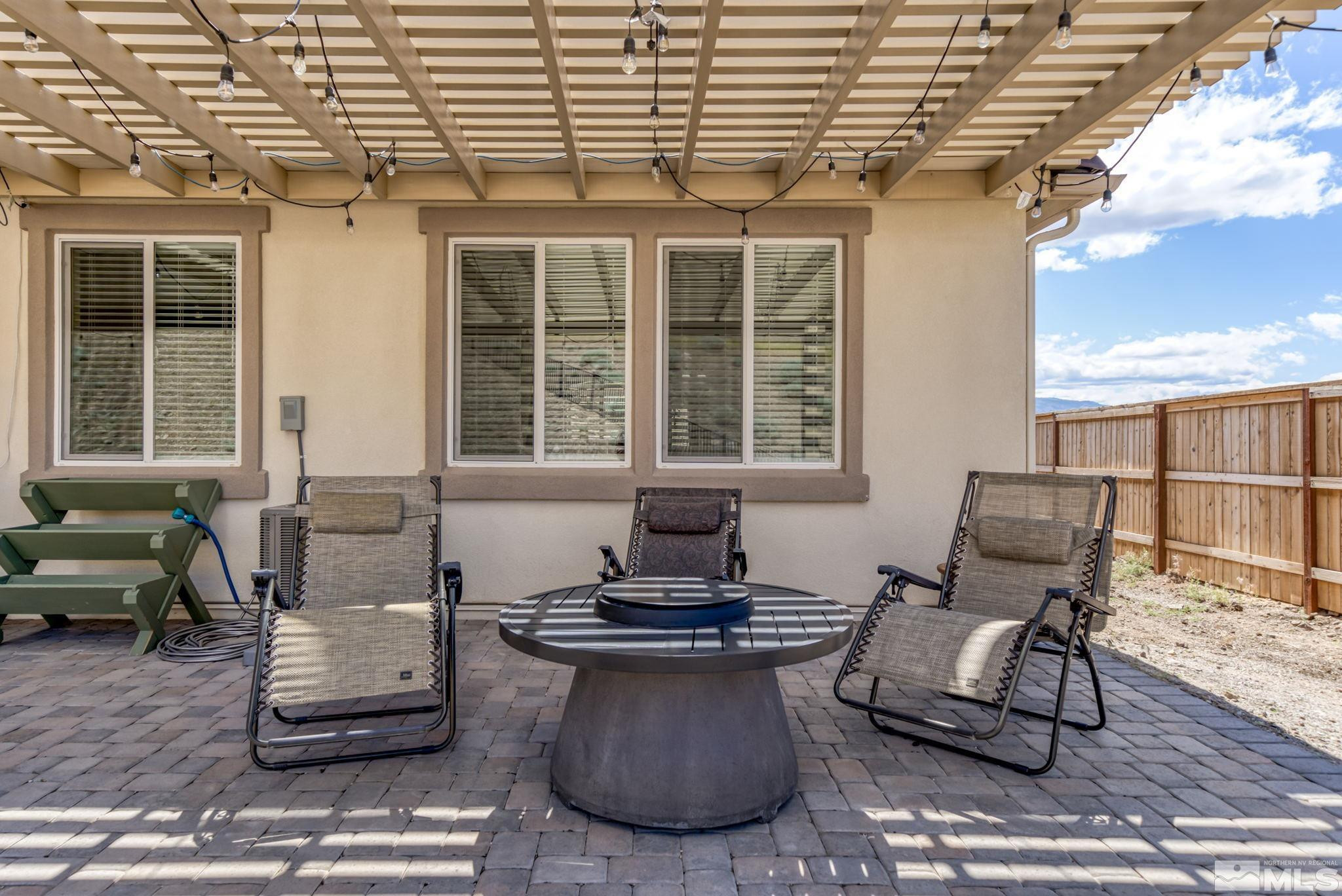 10490 Gold Mine Drive Reno, NV 89521 - Photo 36 of 40 a building outdoor space with patio furniture