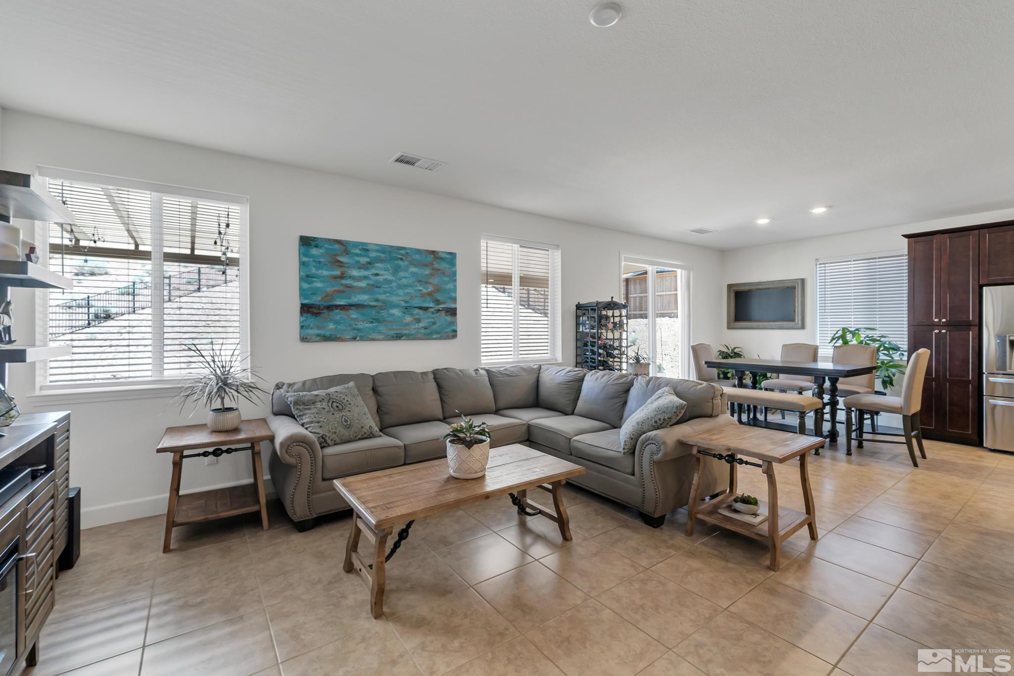10490 Gold Mine Drive Reno, NV 89521 - Photo 7 of 40 a living room with furniture and a large window