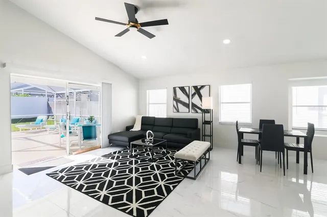 a living room with a couch and a table