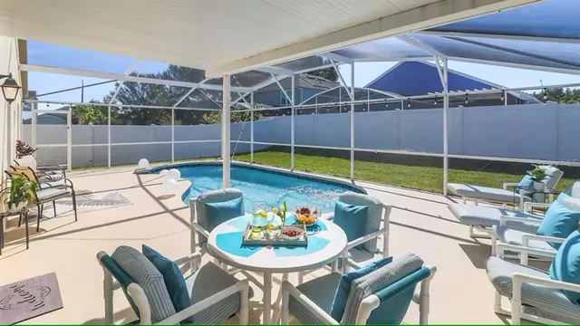 a room with furniture and a flat screen tv