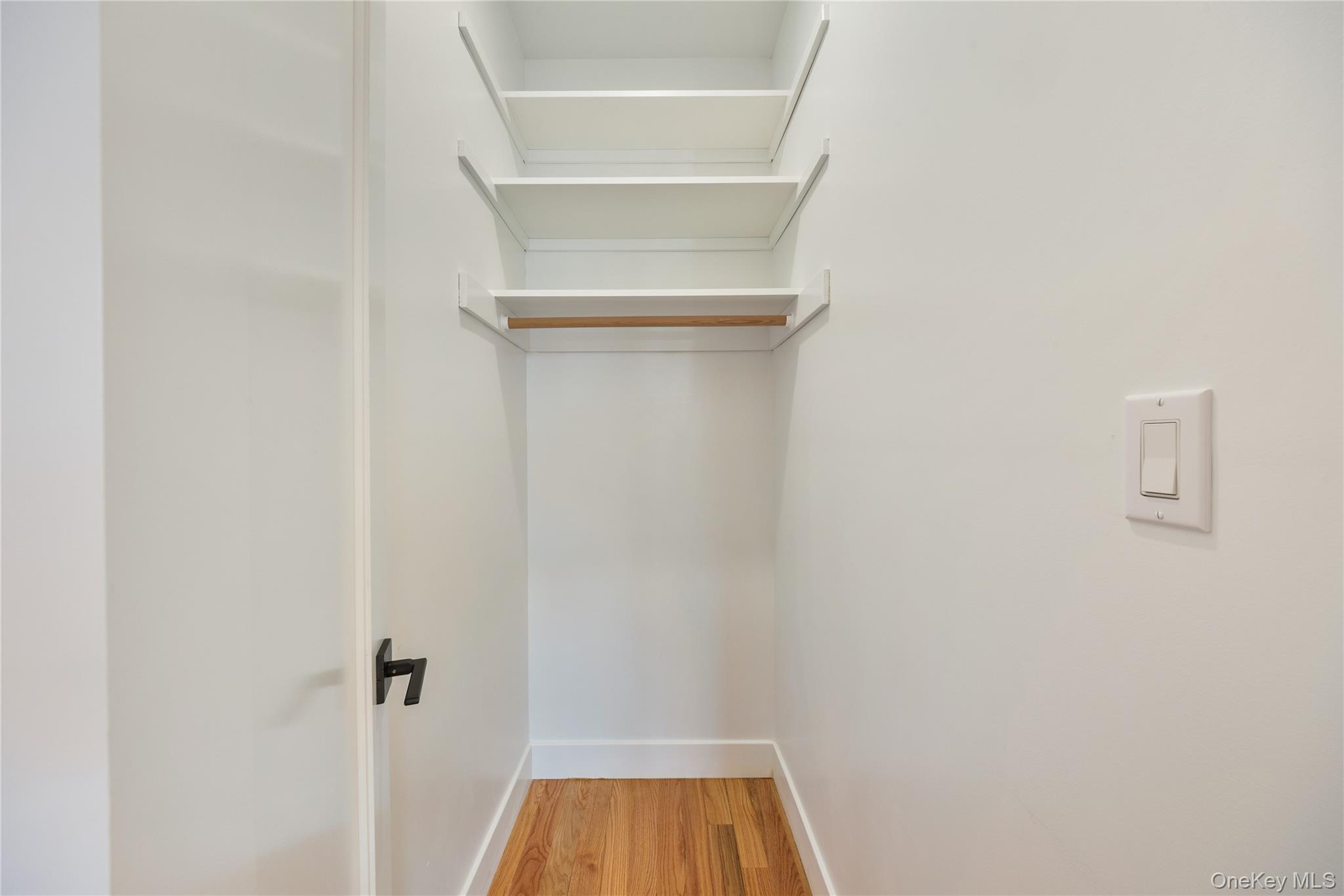 17 Lazer Court, Unit 103 Spring Valley, NY 10977 - Photo 29 of 36 a view of a room with racks on the wall