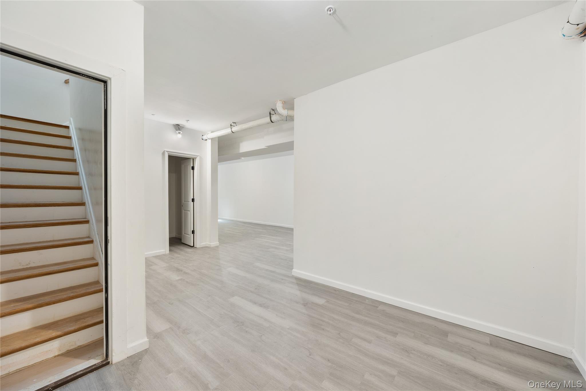 17 Lazer Court, Unit 103 Spring Valley, NY 10977 - Photo 33 of 36 a view of a room with an empty space