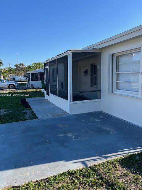 2820 Southwest 65th Avenue Miramar, FL 33023 - Photo 22 of 24 a view of a porch in front of a house