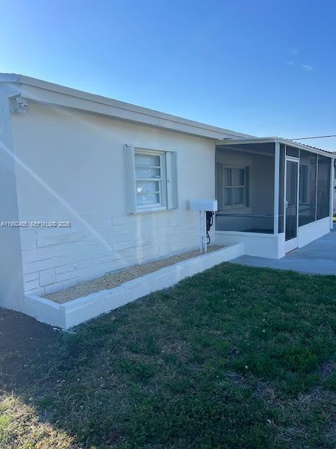 2820 Southwest 65th Avenue Miramar, FL 33023 - Photo 24 of 24 a view of outdoor space yard and porch