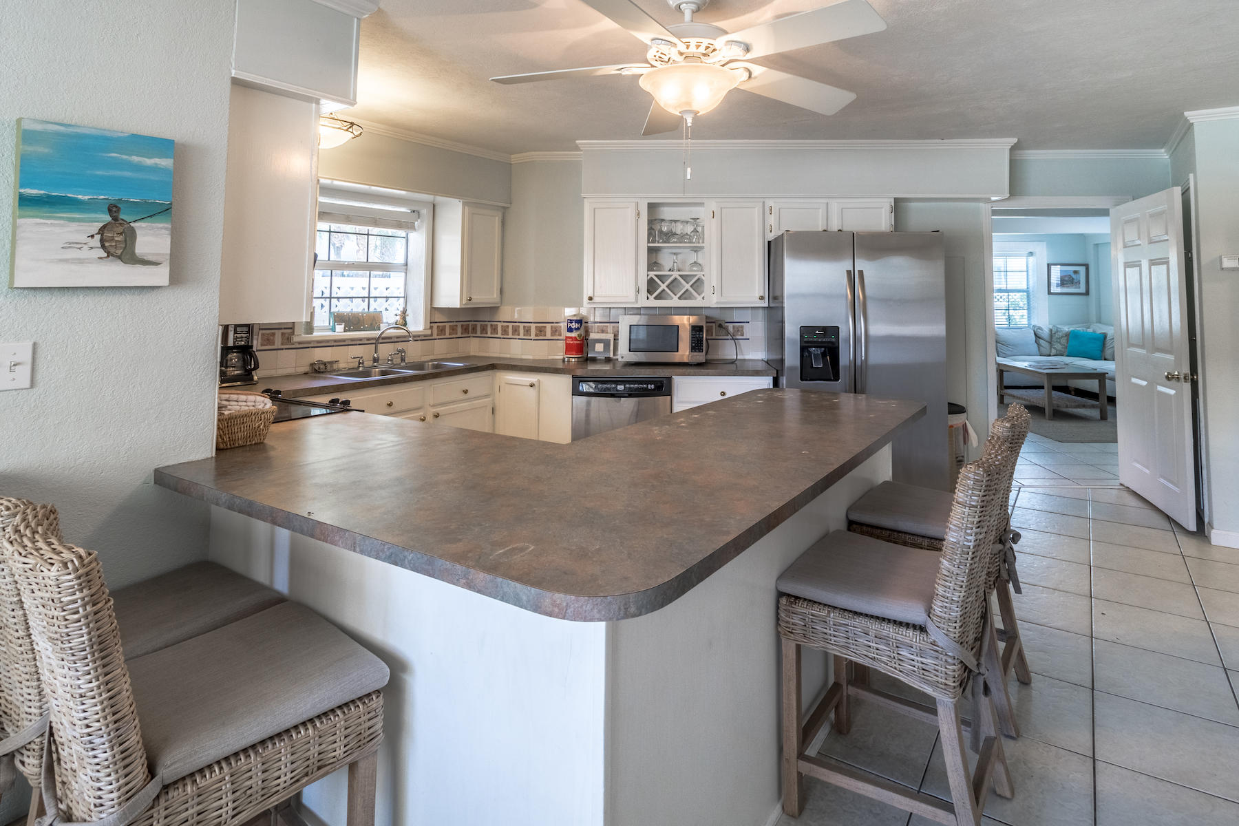 522 Defuniak Street, Unit 30A Santa Rosa Beach, FL 32459 - Photo 13 of 46 a view dining table chairs and a refrigerator