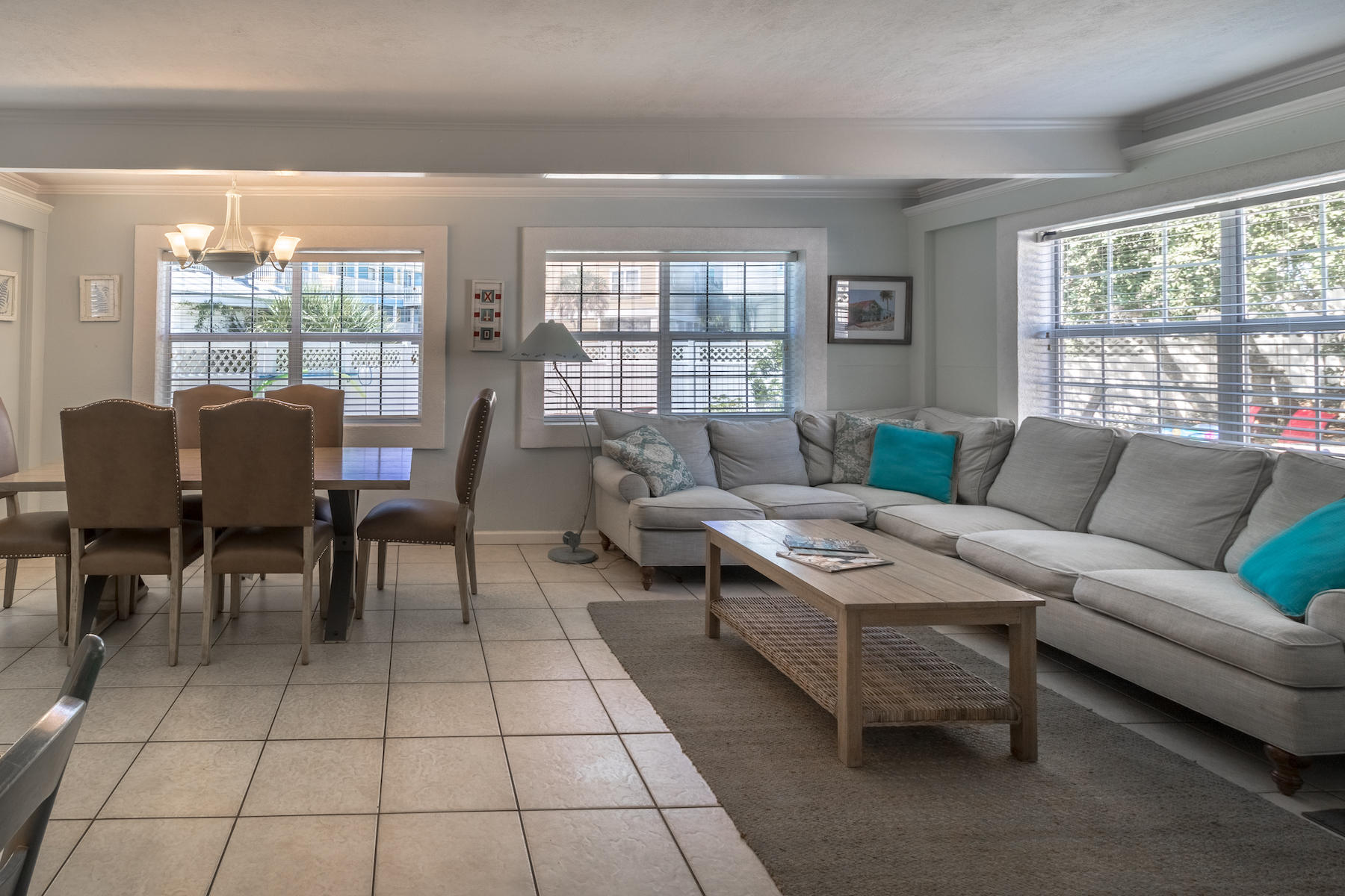 522 Defuniak Street, Unit 30A Santa Rosa Beach, FL 32459 - Photo 15 of 46 a living room with furniture and a floor to ceiling window