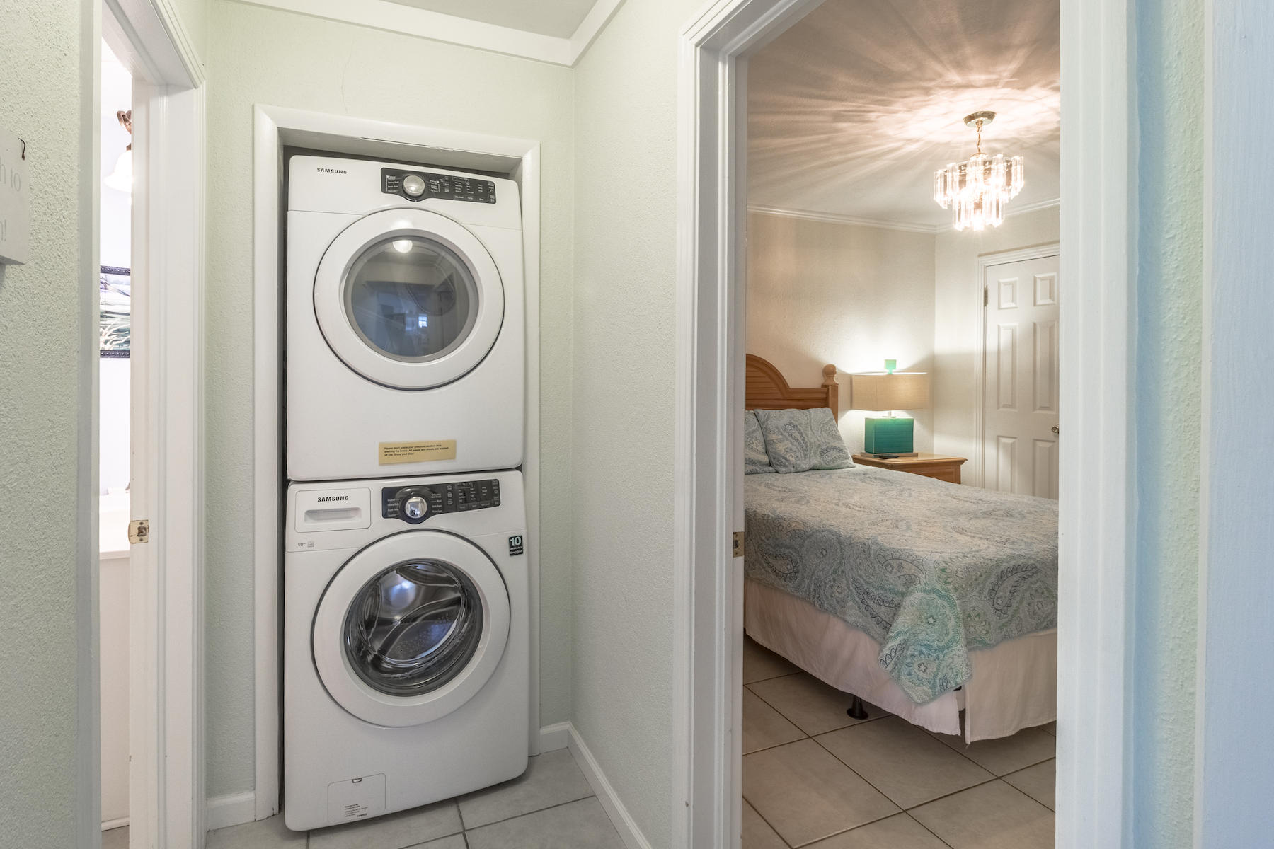 522 Defuniak Street, Unit 30A Santa Rosa Beach, FL 32459 - Photo 22 of 46 a view of a hallway with washer and dryer