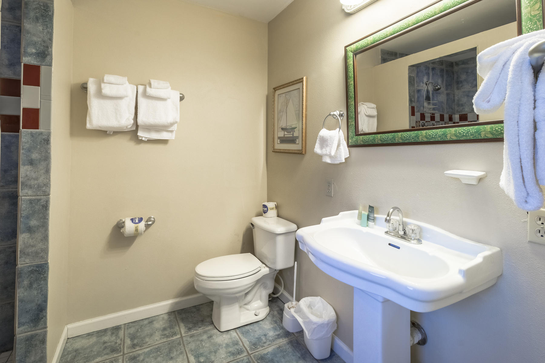 522 Defuniak Street, Unit 30A Santa Rosa Beach, FL 32459 - Photo 39 of 46 a bathroom with a sink mirror and toilet