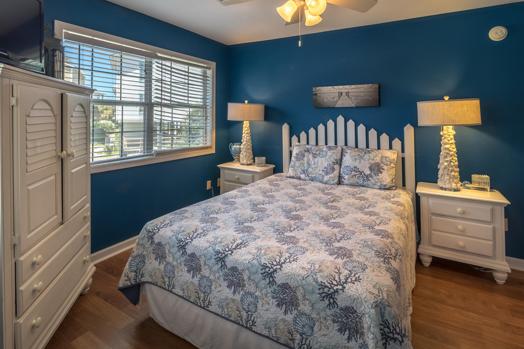 522 Defuniak Street, Unit 30A Santa Rosa Beach, FL 32459 - Photo 40 of 46 a bedroom with a bed and a window