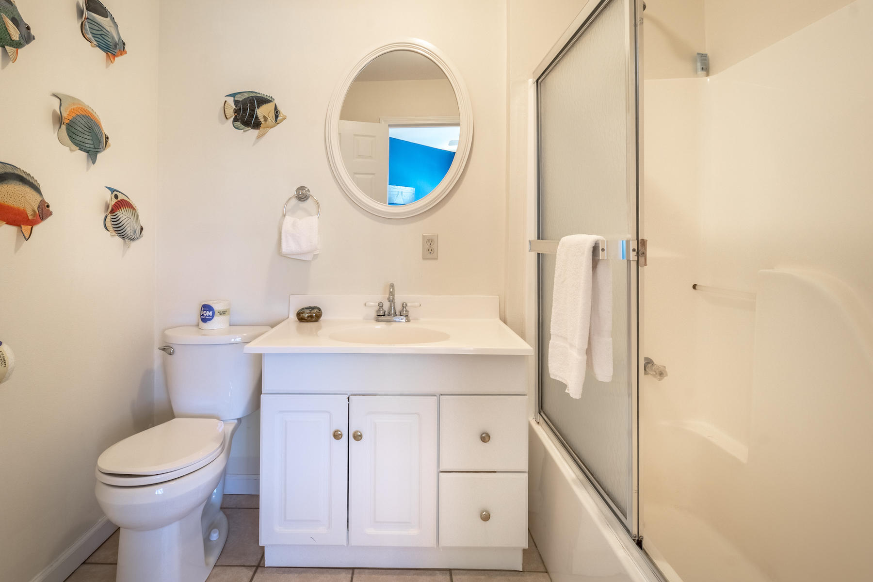 522 Defuniak Street, Unit 30A Santa Rosa Beach, FL 32459 - Photo 41 of 46 a bathroom with a sink mirror and toilet