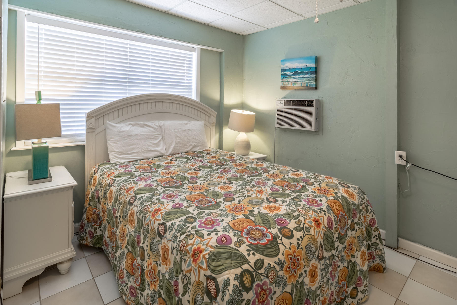 522 Defuniak Street, Unit 30A Santa Rosa Beach, FL 32459 - Photo 44 of 46 a large bed sitting in a bedroom next to a window