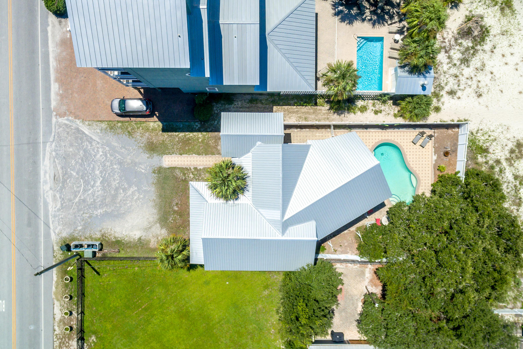 522 Defuniak Street, Unit 30A Santa Rosa Beach, FL 32459 - Photo 7 of 46 a view of swimming pool with a yard and seating area