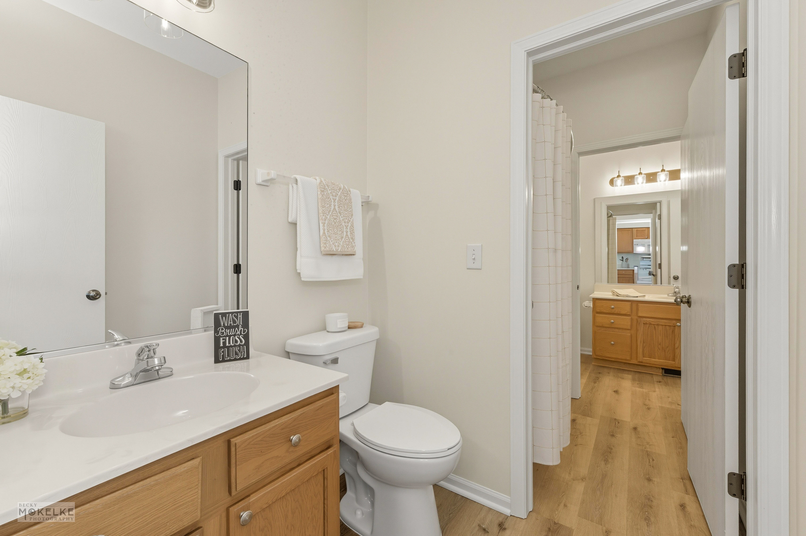 2813 Hoffman Street Plano, IL 60545 - Photo 15 of 27 a bathroom with a sink toilet and shower