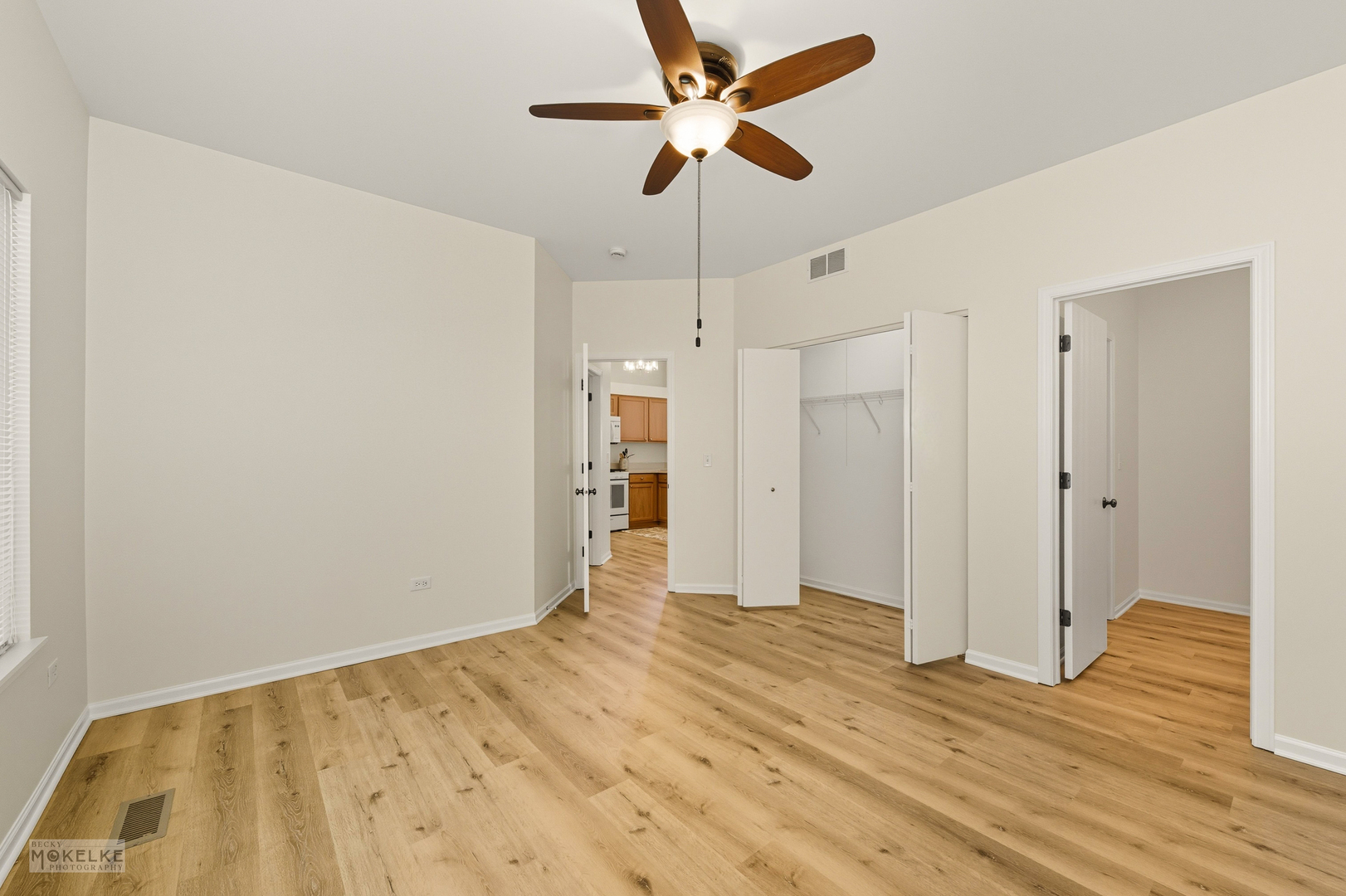2813 Hoffman Street Plano, IL 60545 - Photo 18 of 27 a view of empty room with wooden floor