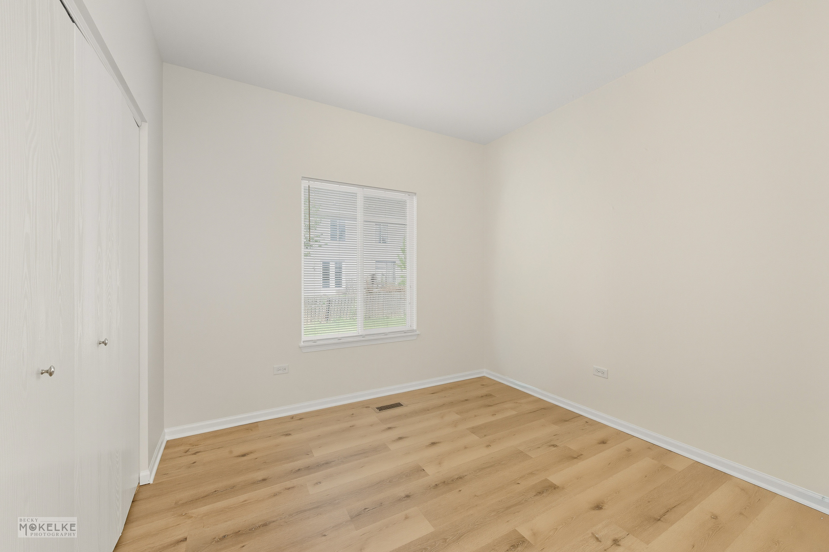 2813 Hoffman Street Plano, IL 60545 - Photo 21 of 27 an empty room with a window